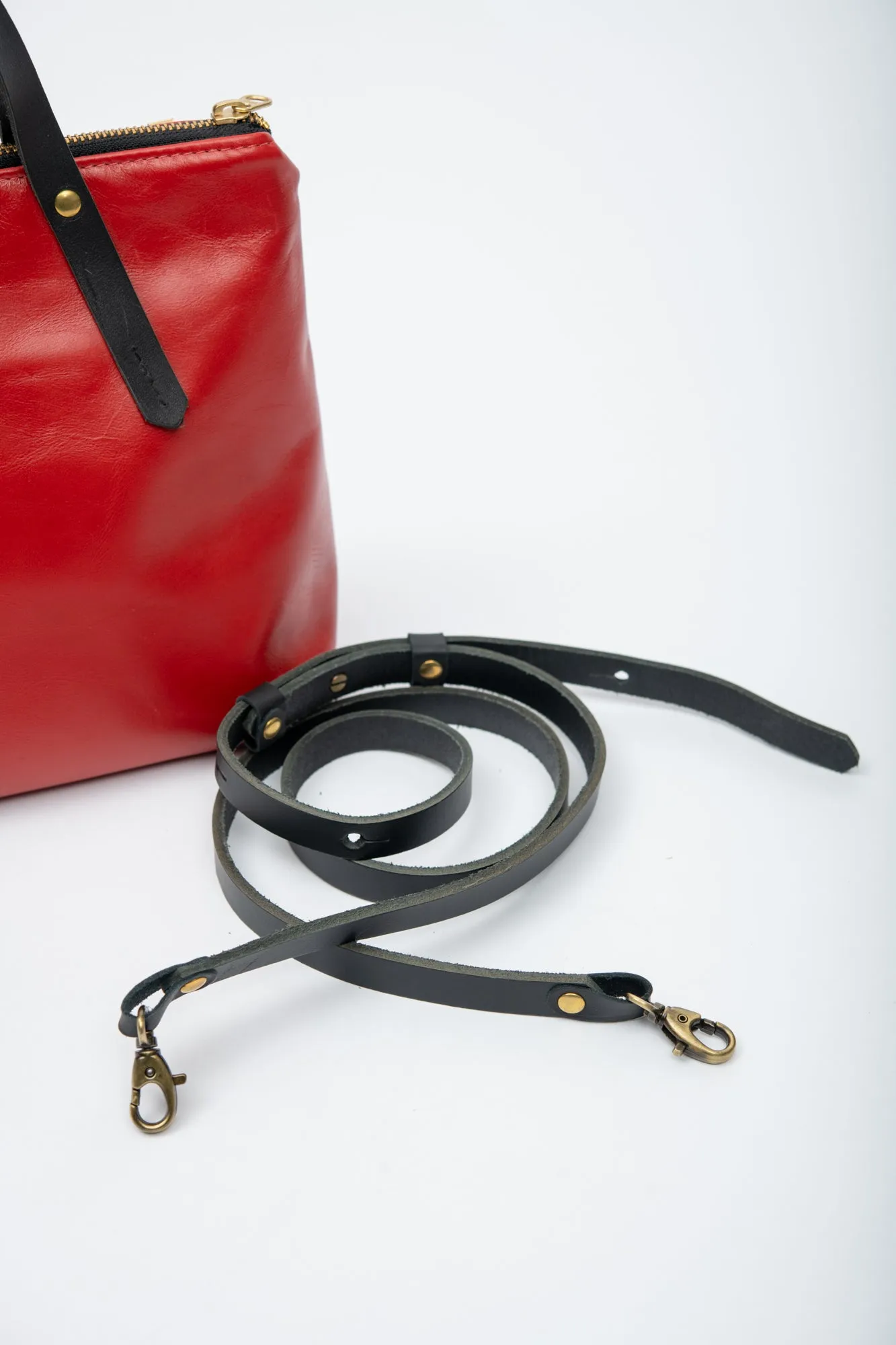 Leather handbag with crossbody strap PAPINEAU model