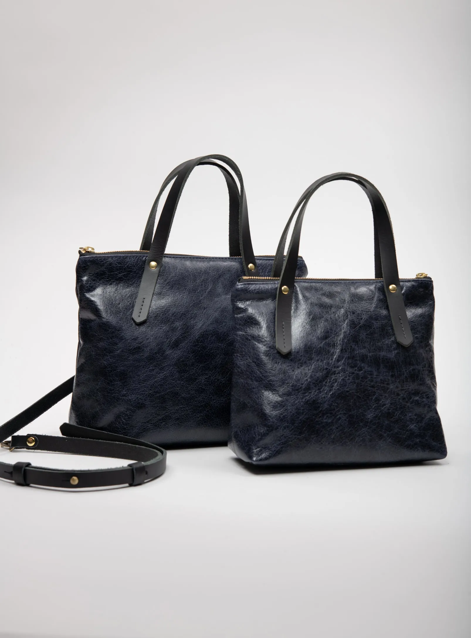 Leather handbag with crossbody strap PAPINEAU model