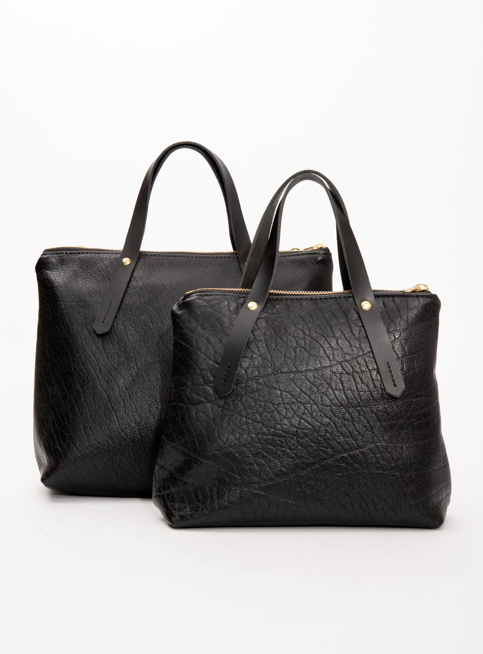 Leather handbag with crossbody strap PAPINEAU model